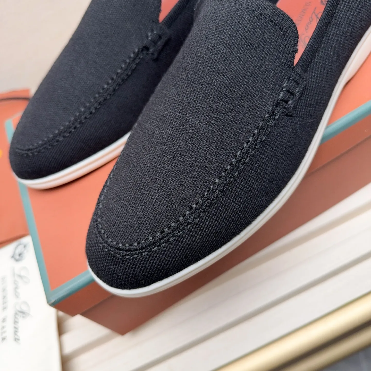 Men's Men's Shoes 💰400 Loro PIana moccasins are made of wish wool fabric. The upper is made of knitted fabric, made on a loom, and then attached to a rubber sole. The Rain System's water-repellent treatment enhances the shoe's functional design, while the suede details give the shoe a sense of elegance and sophistication. Made from Wish, fine wool from Australian and New Zealand Merino sheep